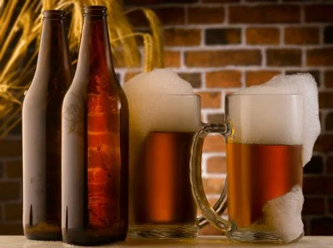 Beer mugs in a rustic setting Stock Photos