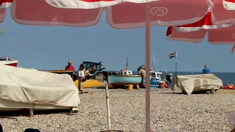 Beer, pan across beach from cafe 스톡 동영상 138071702