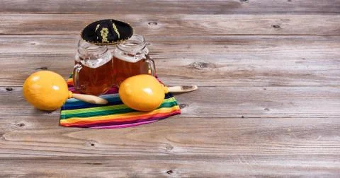 Beer with party objects on rustic wooden table Stock Photos