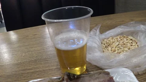 Beer in a plastic glass Video stock 168157965