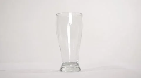 Beer pour on white Stock Footage 63812015
