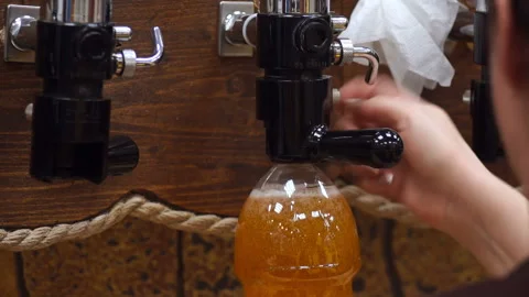 The beer poured into the bottle Stock Footage 85897140