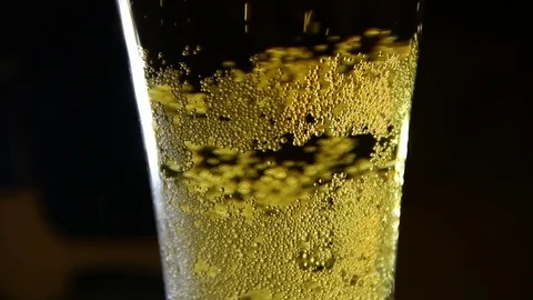 Beer poured into a glass with bubble Stock Footage 70283173