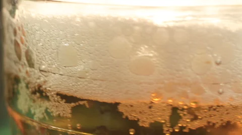 Beer is poured into a glass Stock Footage 62017284