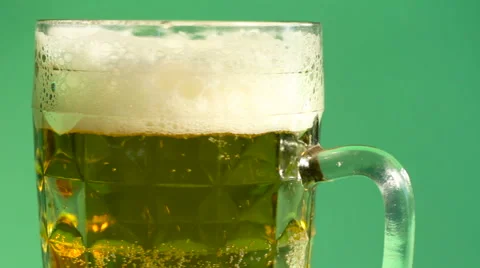 Beer is poured into a glass Stock Footage 62017640