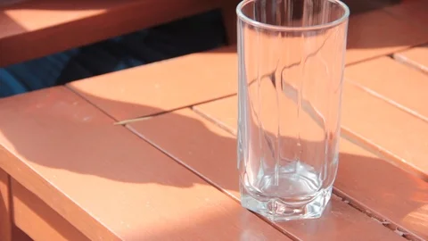 Beer is poured into the glass summer table Video stock 87597685