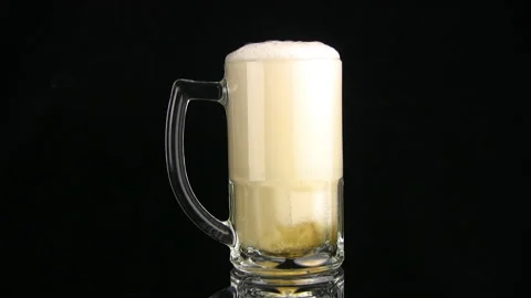 Beer is poured in a mug Видео 106466717