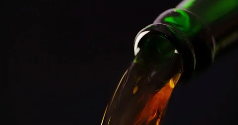 Beer pouring from Bottle closeup macro shot 4K Stock Footage 103637623