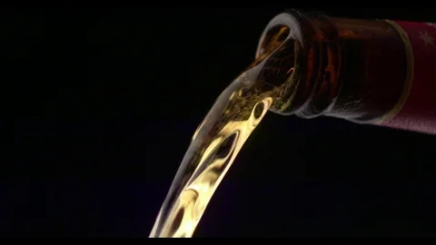 Beer Pouring From Bottle Stockbeeldmateriaal 81793468