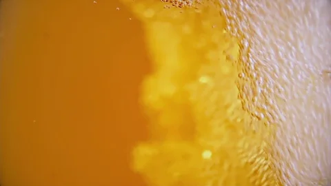 Beer Pouring With Bubbles - Closeup - Slow, slow motion Stock Footage 122949162