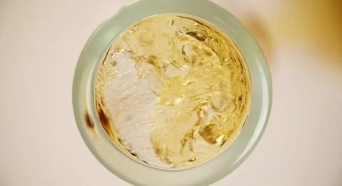 Beer is pouring in Glass from Bottom View Extremely closeup Slow motion Stock Footage 103642935