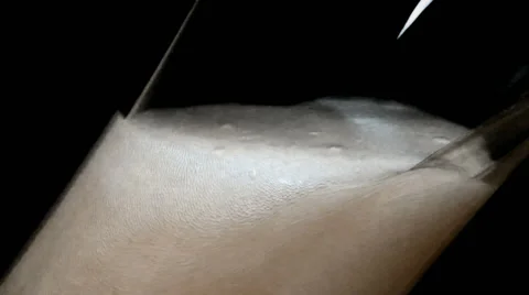 Beer is pouring into the  glass Stock Footage 45741232