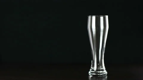 Beer is pouring into a glass Stock Footage 120578058