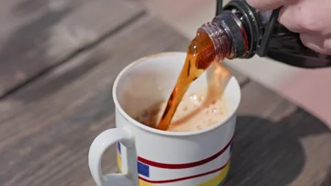 Beer pouring into mug on table Video stock 276284364