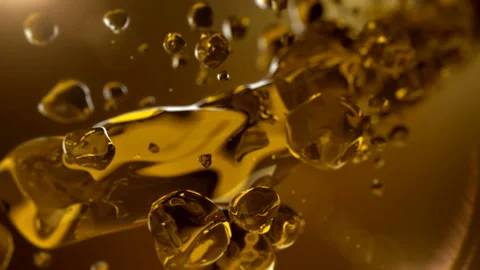 Beer is pouring in slow motion. Splash of alcohol, oil, white wine tee. Stock Footage 87869706