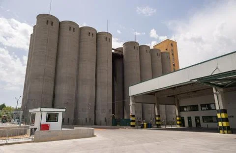 Beer processing and storage silos in beer factory Stock Photos