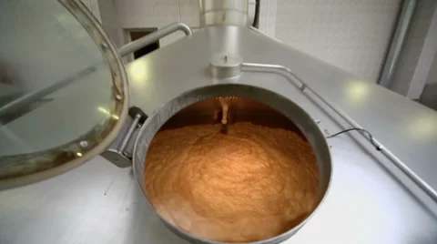 Beer rotates in big cistern with hatch at workshop Video stock 32153044