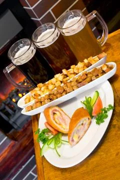 Beer with snack Stock Photos