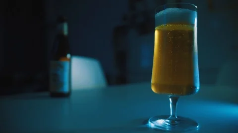 Beer Sparkling on a Table 4K Stock Footage 86334467