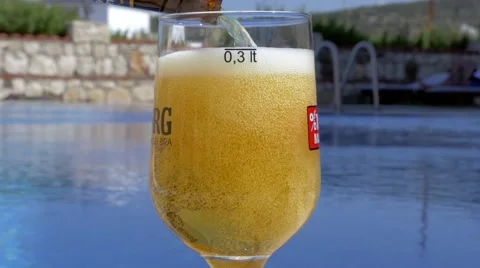 Beer in the swimming pool Stock Footage 53844598