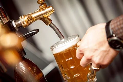 Beer from the tap Stock Photos
