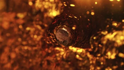 Beer Vortex Flowing through the Bottle Seen from the Inside in Slow Motion Stock Footage 271109490