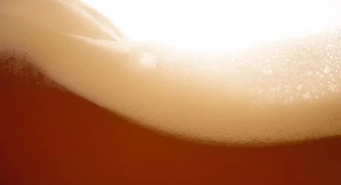 Beer wave background with foam bubbles Extremely closeup slow motion Stock Footage 103639247