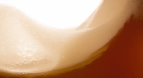 Beer wave background with foam bubbles Extremely closeup slow motion Stock Footage 103639254