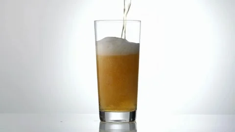 Beer Wave Curve Shape Inside a Glass In Slow Motion Macro Shot on Phantom C.. Stock Footage 265766646