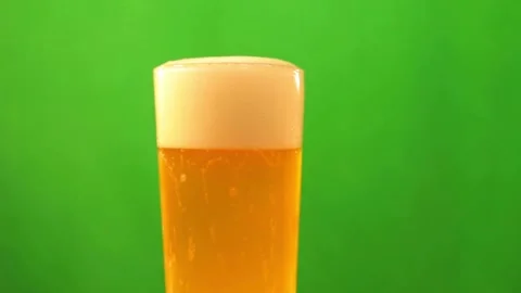 Beer Wave Curve Shape Inside a Glass In Slow Motion Macro Shot on Phantom C.. Stock Footage 265767677