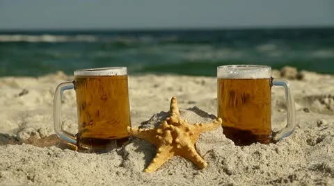Beers and Starfish on the beach Stock Footage 11059095
