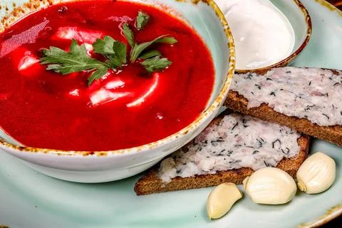 Beet Borscht, Garlic with Bread, Top View cloves of garlic Stock Photos