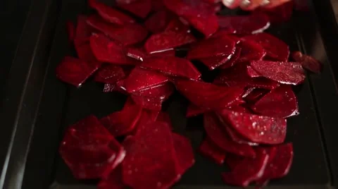 Beet chips on a baking sheet Video stock 54826056