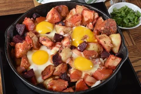 Beet hash with eggs Stock Photos