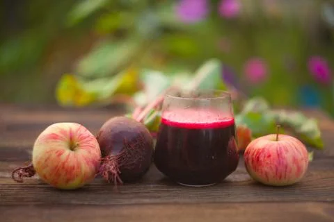 Beet juice in glass on  table Stock Photos