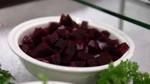 Beet pieces Beetroot Beta vulgaris is root vegetable also known as red beet Stock Footage 309257075