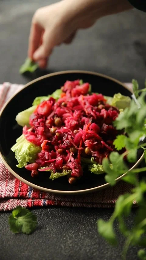 Beet salad baked beetroot, potatoes, green peas, green leaf salad tasty food Stock Footage 292307026