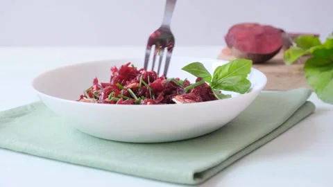 Beet salad in a white bowl on the table Stock Footage 280007300
