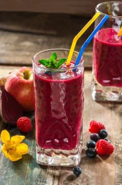 Beetroot, apple, ginger and berries smoothie Stock Photos