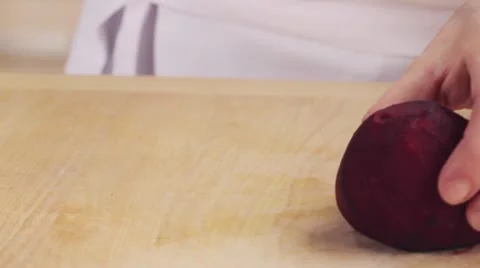 A beetroot being halved Stock Footage 24671284
