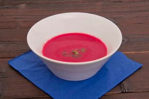 Beetroot creme soup on a table Stock Photos