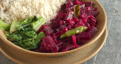 Beetroot curry with sona masoori rice and stir-fried lettuce. Stock Footage 281832588