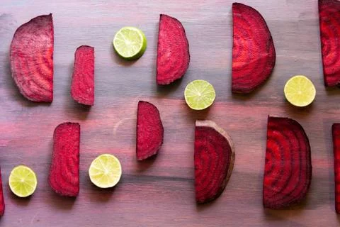 Beetroot in the form of a pattern with lemon slices on a vintage background Stock Photos