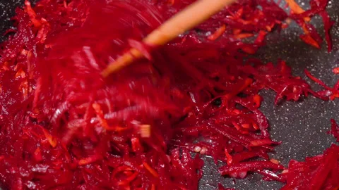Beetroot is fried in a frying pan Stock Footage 255125643