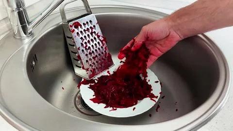 Beetroot Grating Action at Sink with Plate Ready Below Video stock 321049164