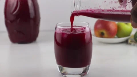 Beetroot Juice - Simple and Healthy Beet Juice - Chef-Prepared Close-Up Shot Stock Footage 287871440