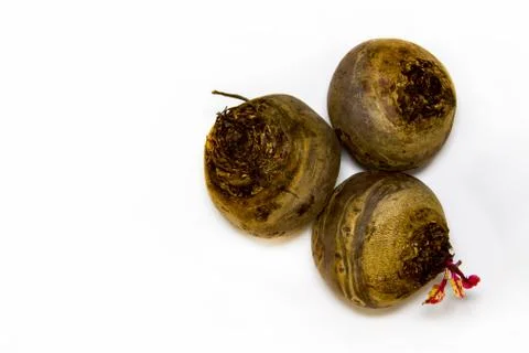 Beetroot is not cleaned fresh on a white background Stock Photos