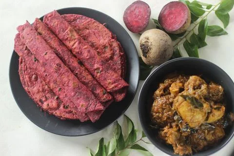Beetroot Paratha is a Indian pan fried whole wheat flatbread made of wheat fl Stock Photos