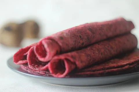 Beetroot Paratha is a Indian pan fried whole wheat flatbread made of wheat fl 스톡 사진