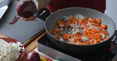 Beetroot peel off, vegetable soup preparing Stock Footage 146245860